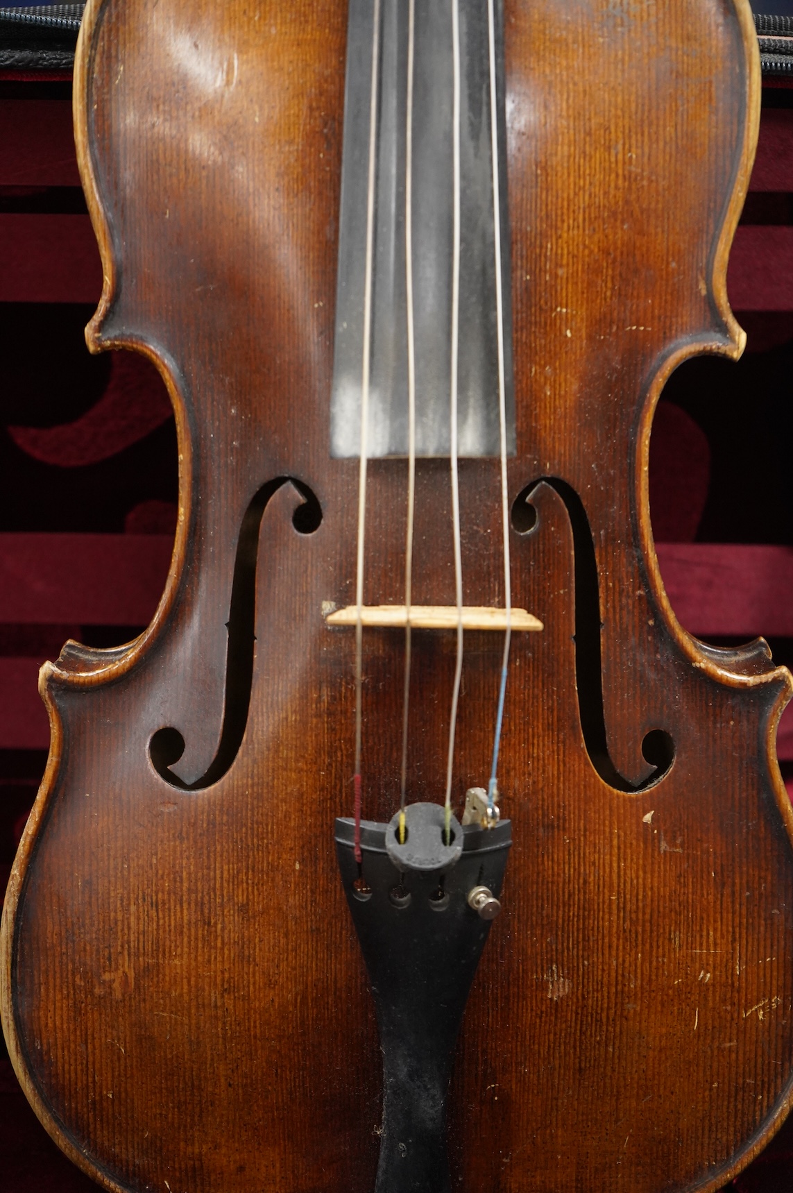 A cased late 19th century German viola, the body 15 3/4”, bearing a label reading Max Lutz 1939
